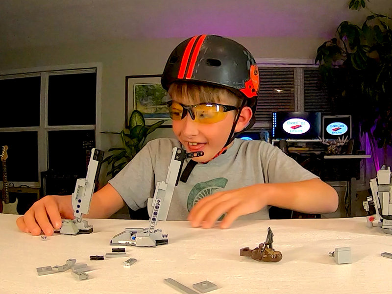 Kyle with helmet on building the AT-ST Walker
