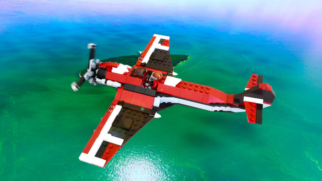 Old Fighter Plane flying over water